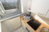 ** Reserviert ** 
Ideale Kapitalanlage: Modernes Apartment mit separater Küche & Balkon - Küche