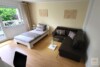 Helles Apartment in Oberkassel mit SW-Terrasse & Gartenblick - Wohn- & Schlafbereich