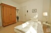 Stil-Altbau Apartment in Pempelfort mit Balkon & Kamin - Wohnbereich