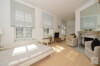 Stil-Altbau Apartment in Pempelfort mit Balkon & Kamin - Wohnbereich